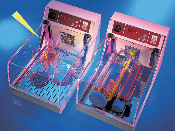 Opening and closing mechanisms for protective hoods in mini...